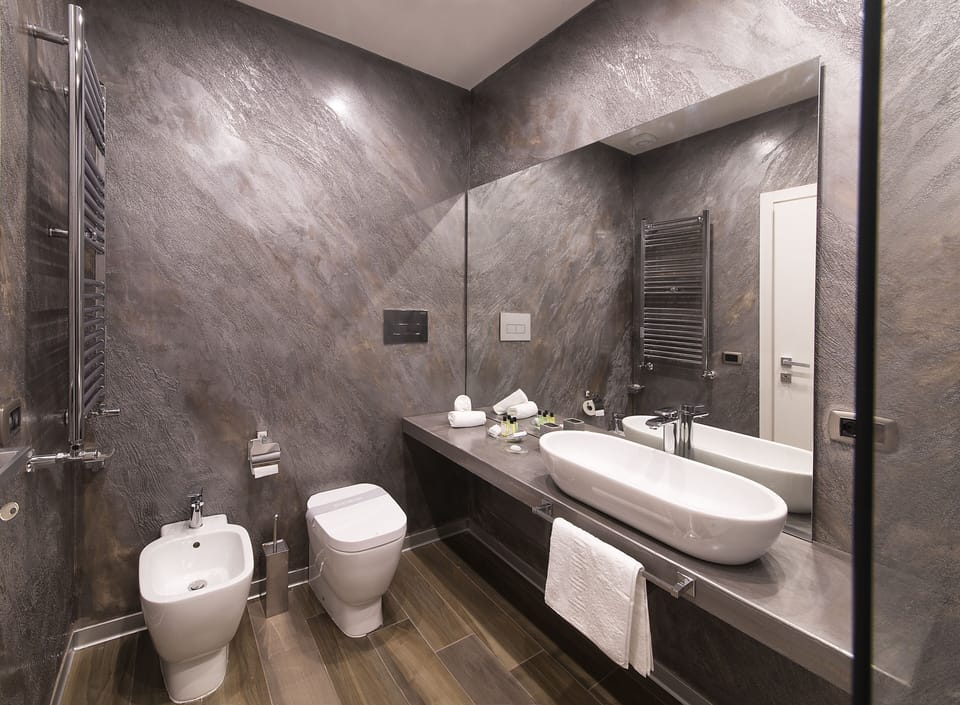 Hair dryer, slippers, bidet, towels