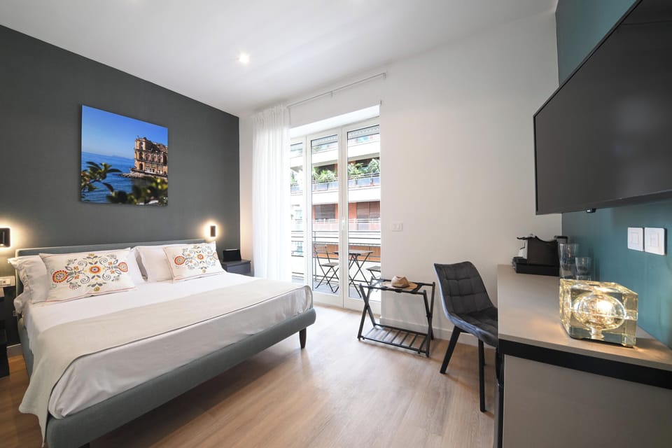 Deluxe Room, Balcony | Minibar, in-room safe, free WiFi