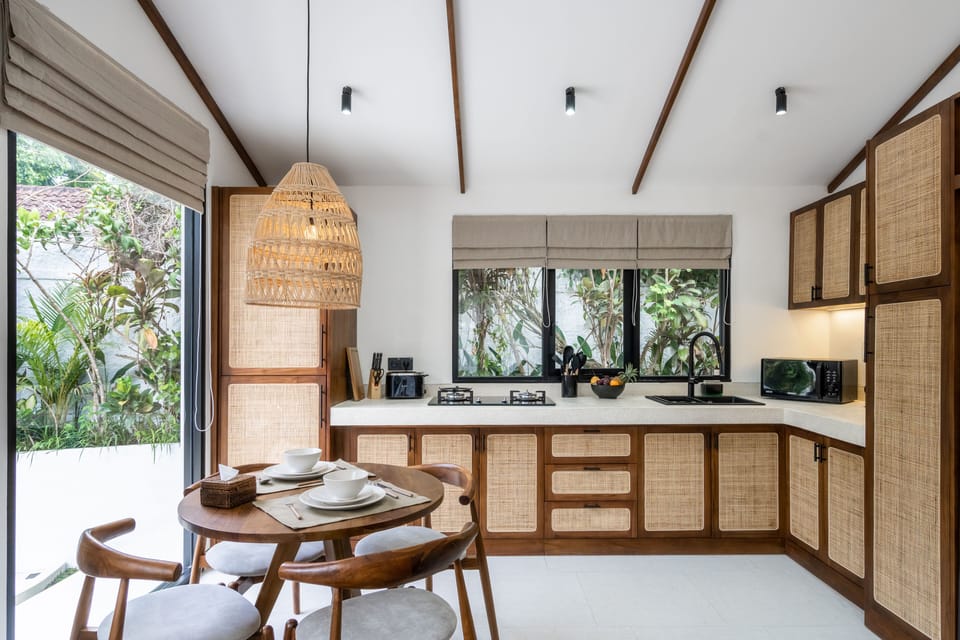 Villa | Private kitchen | Fridge, microwave, cookware/dishes/utensils, cleaning supplies