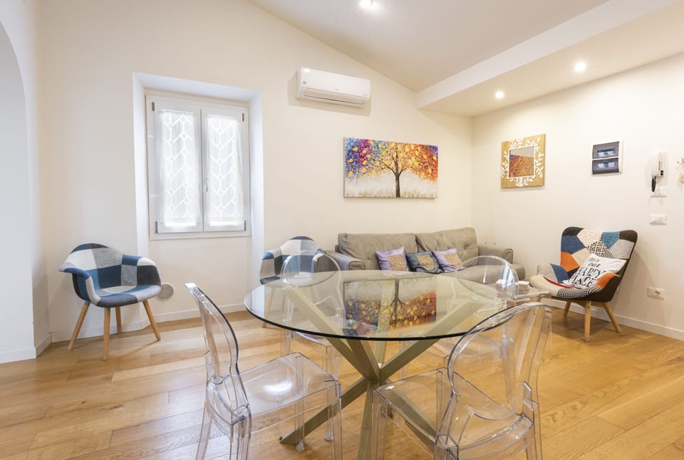 Design Apartment, City View | Living area | 40-inch flat-screen TV with digital channels