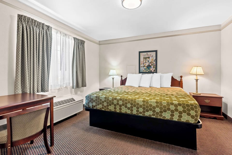 Suite, Multiple Beds, Non Smoking, Refrigerator & Microwave (with Sofabed) | Desk, laptop workspace, blackout drapes, iron/ironing board