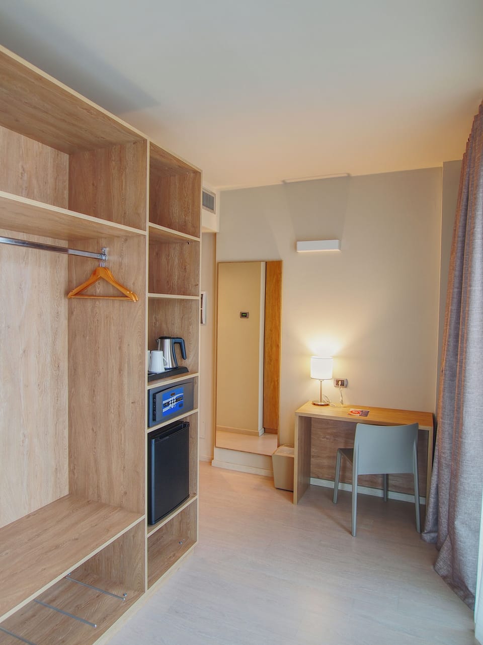 Down comforters, minibar, in-room safe, desk
