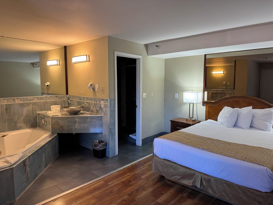 Studio Suite, 1 Queen Bed, Non Smoking | Desk, laptop workspace, blackout drapes, iron/ironing board