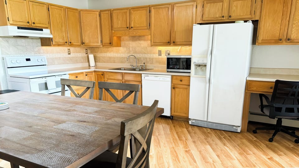 Apartment, 2 Bedrooms, River View | Blackout drapes, iron/ironing board, free WiFi, bed sheets