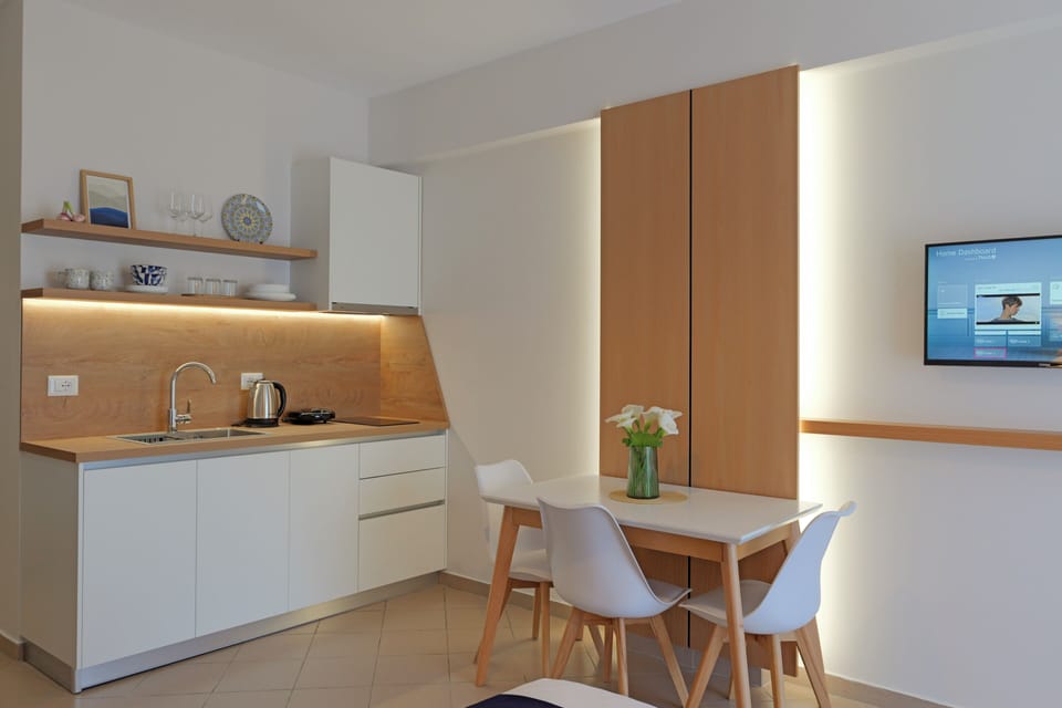 Apartment, Sea View | Private kitchen | Fridge, stovetop, toaster, cookware/dishes/utensils