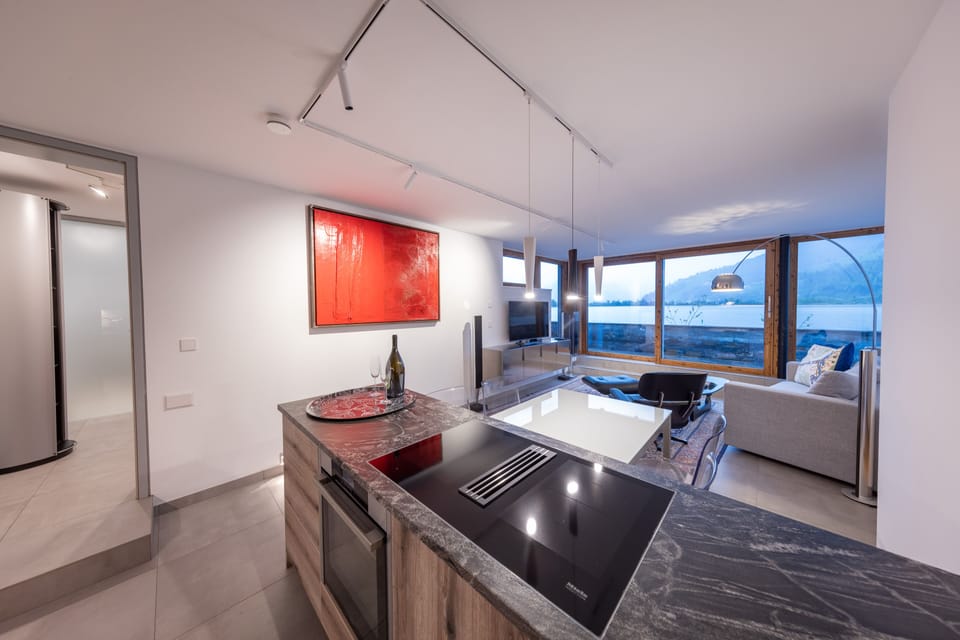 Luxury Condo | Private kitchen | Full-size fridge, microwave, oven, stovetop