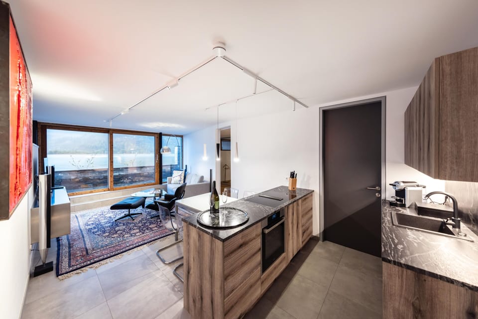 Luxury Condo | Living area | 55-inch Smart TV with cable channels, Netflix, heated floors