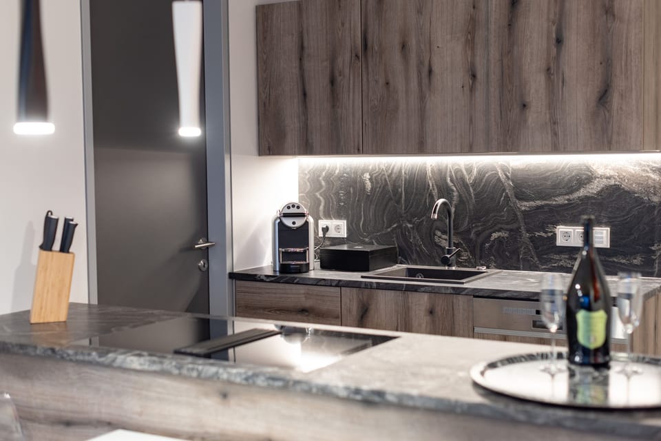 Luxury Condo | Private kitchen | Full-size fridge, microwave, oven, stovetop