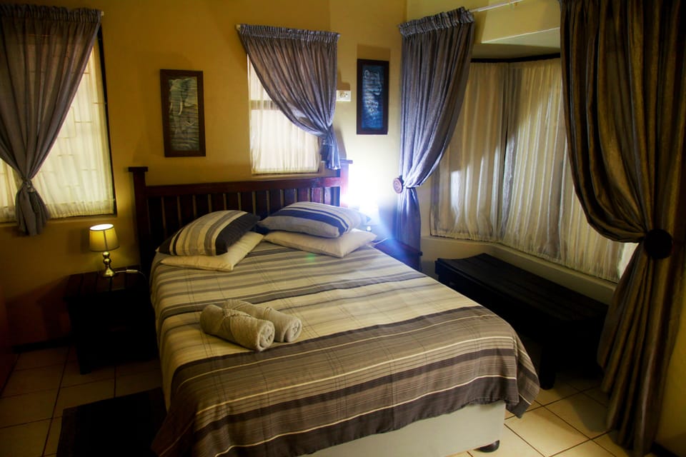 Standard Quadruple Room | In-room safe, bed sheets