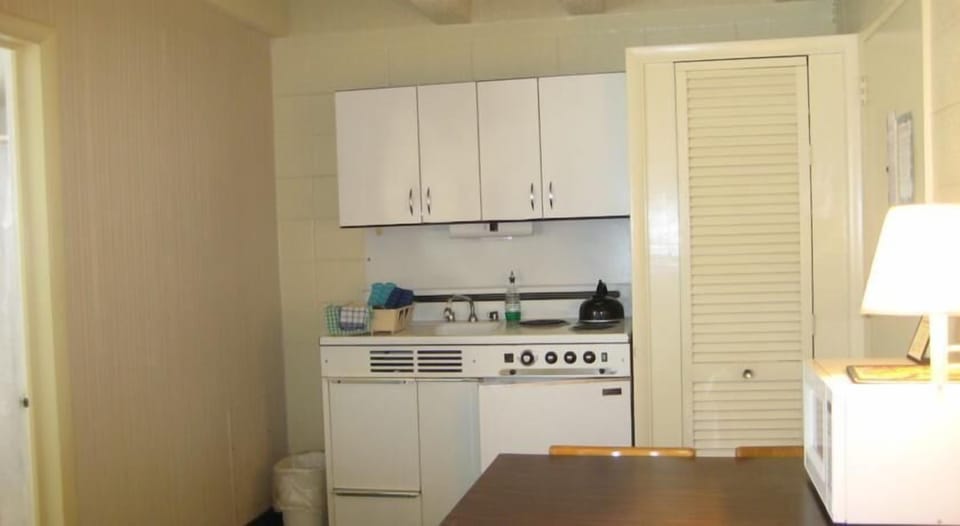 Mini-fridge, microwave, stovetop, coffee/tea maker
