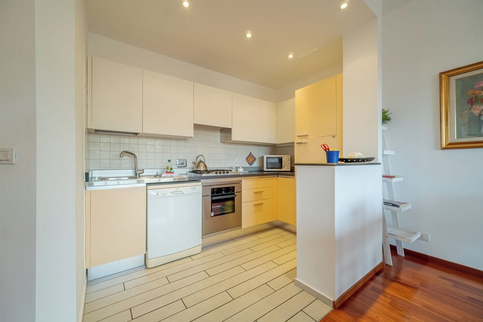 Superior Apartment | Private kitchen | Full-size fridge, microwave, stovetop, dishwasher
