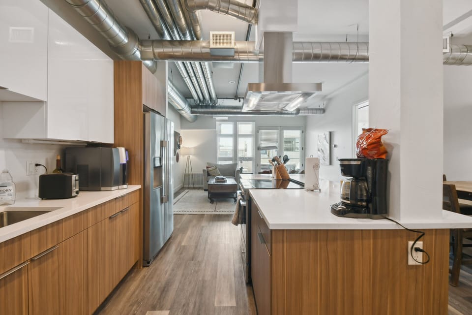 Condo, Multiple Beds, Patio, City View ((R02) 3198 Blake St. Unit 203) | Private kitchen | Fridge, microwave, oven, stovetop