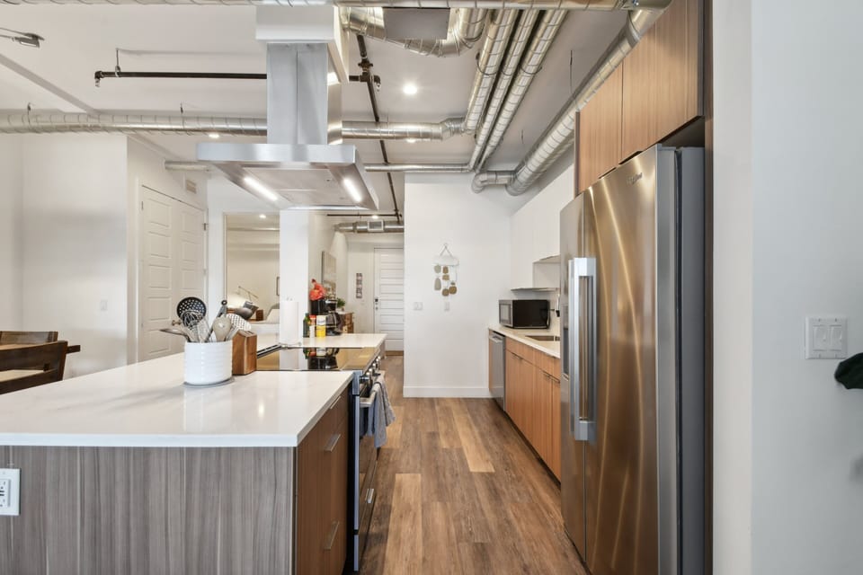 Condo, Multiple Beds, Patio, City View ((R02) 3198 Blake St. Unit 203) | Private kitchen | Fridge, microwave, oven, stovetop