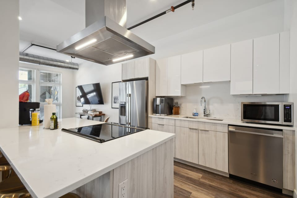 Condo, Multiple Beds, Patio, City View ((R04) 3198 Blake St. Unit 207) | Private kitchen | Fridge, microwave, oven, stovetop