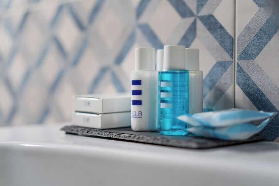 Shower, free toiletries, hair dryer, bathrobes