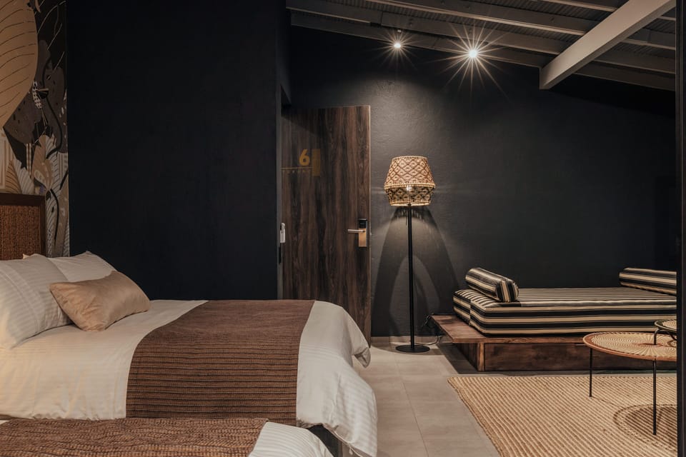 Family Suite, Multiple Beds | Minibar, in-room safe, individually decorated, desk