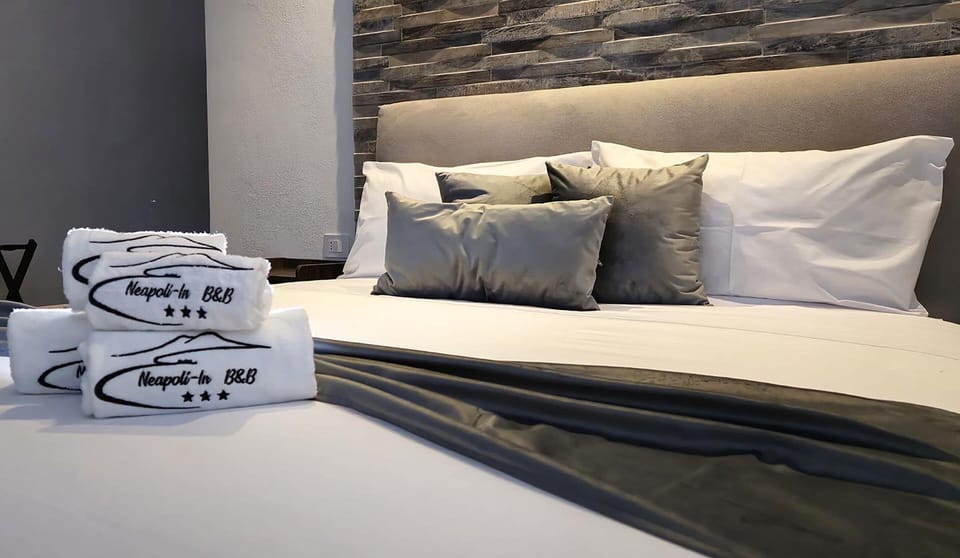 Luxury Quadruple Room | Hypo-allergenic bedding available, down comforters, memory foam beds