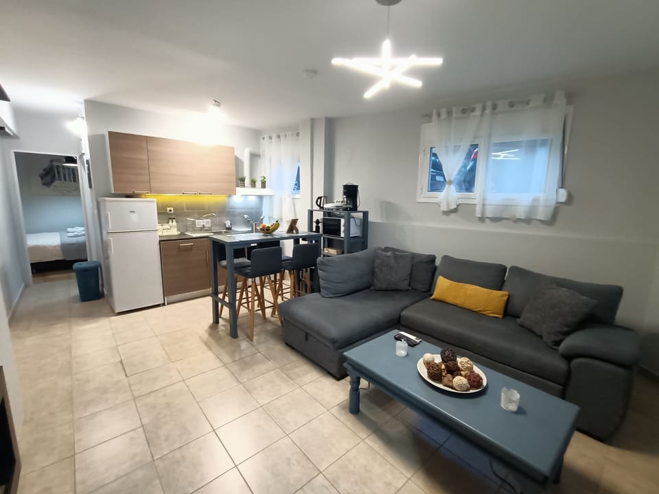 City Apartment | Living room | 55-inch Smart TV with satellite channels