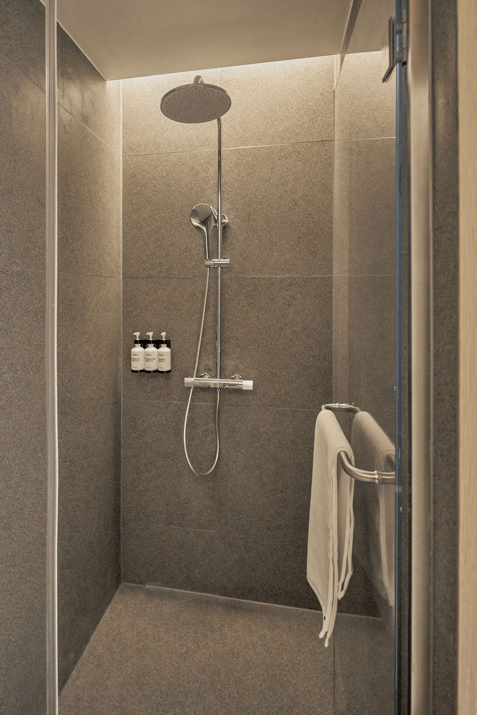 Shower, hydromassage showerhead, designer toiletries, hair dryer