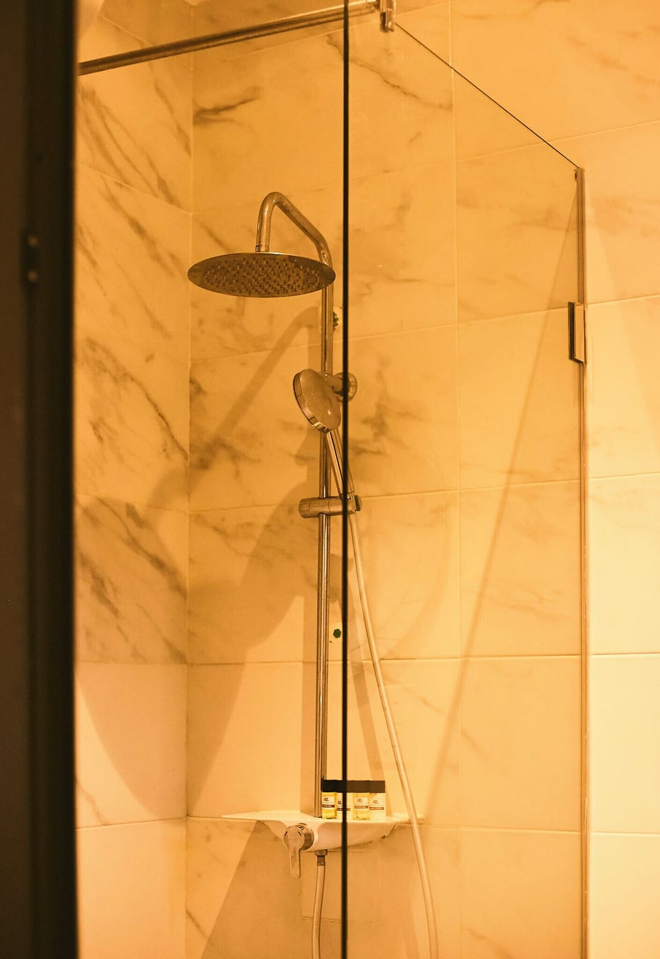 Deluxe Room, 1 Queen Bed | Bathroom | Shower, hydromassage showerhead, slippers, towels