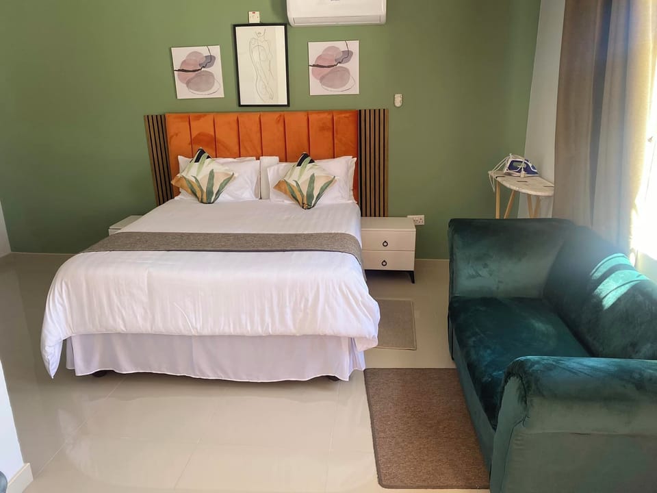 Deluxe Double Room, Patio, Garden View | Desk, laptop workspace, iron/ironing board, WiFi (free)