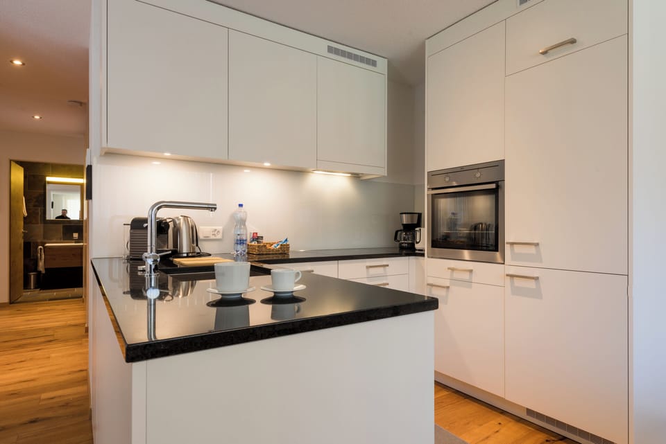 Condo, 2 Bedrooms, Private Bathroom | Private kitchen | Full-size fridge, microwave, oven, stovetop