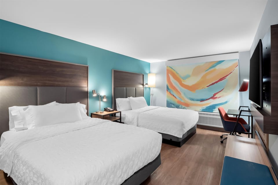 Blackout drapes, soundproofing, iron/ironing board