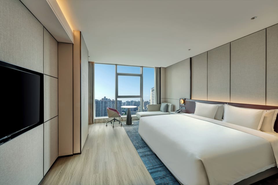 Premium bedding, down comforters, minibar, in-room safe