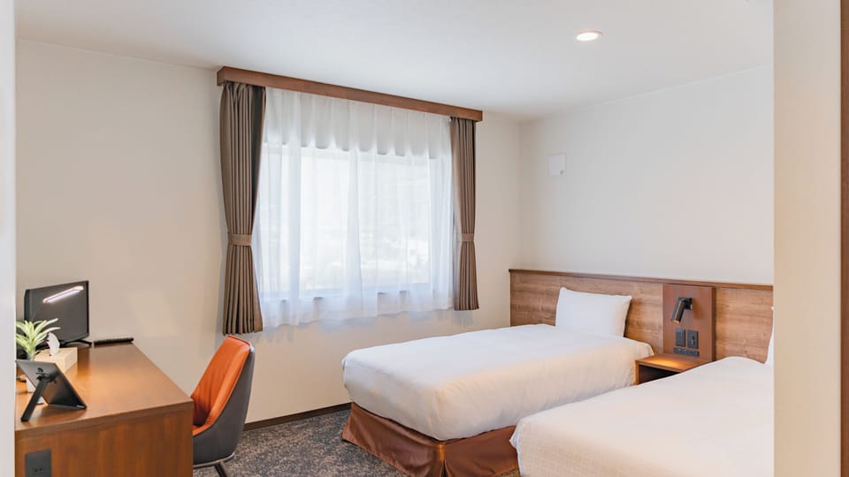 Classic Twin Room | Blackout drapes, free WiFi, bed sheets