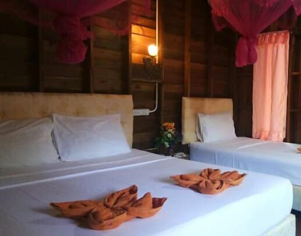 Triple Room | Select Comfort beds, desk, laptop workspace, blackout drapes