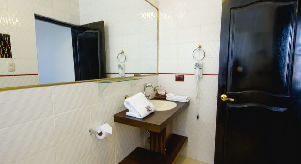 Standard Double Room | Bathroom | Hair dryer, bathrobes, towels, soap