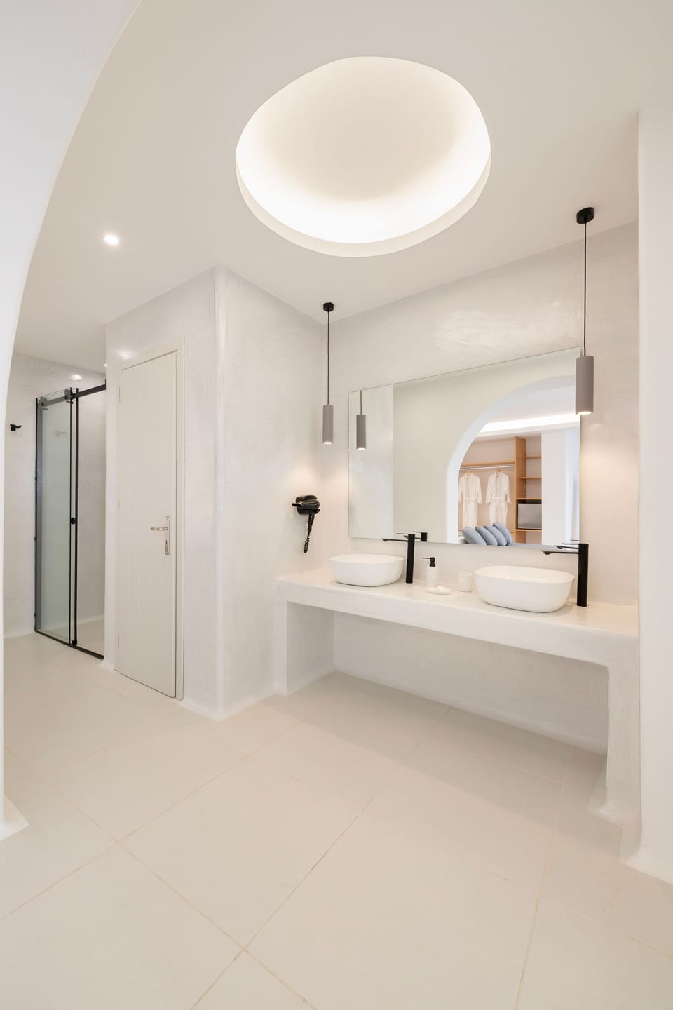 Shower, designer toiletries, hair dryer, slippers