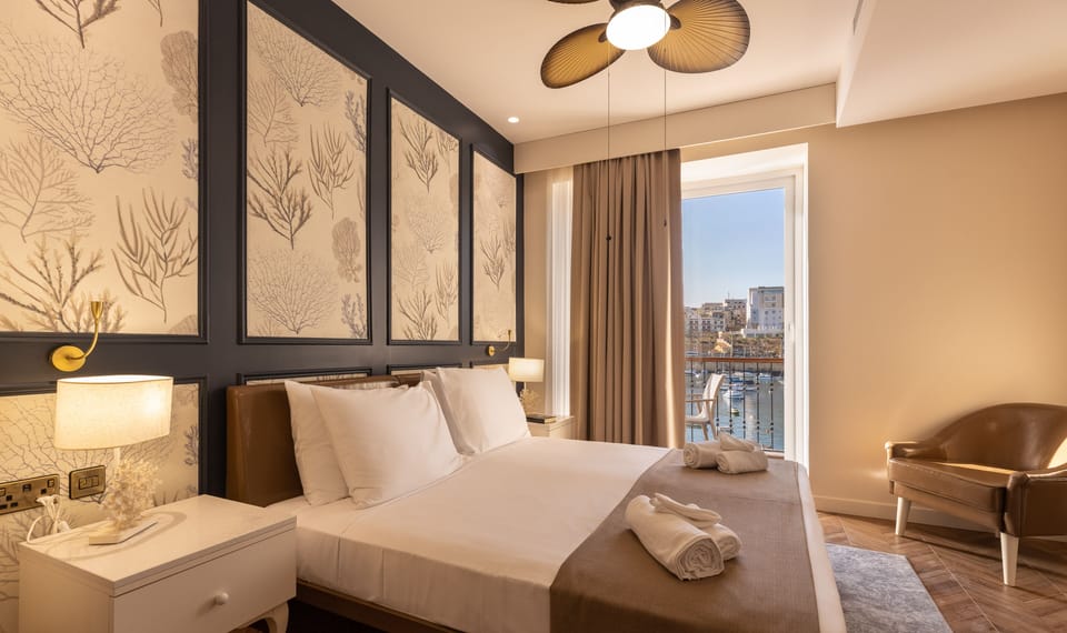 Deluxe Family Room, Balcony, Sea View | In-room safe, desk, laptop workspace, soundproofing