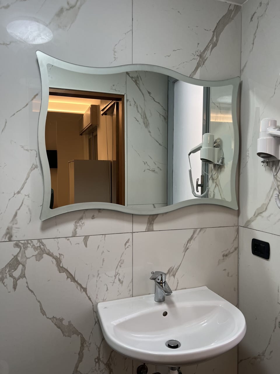 Shower, rainfall showerhead, bidet, towels