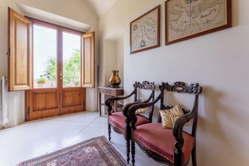 Panoramic Villa, Garden View | Living area | Fireplace