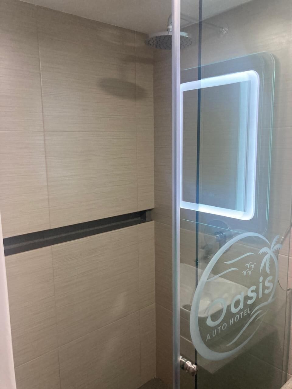 Business Room | Bathroom | Shower, hair dryer, towels, soap
