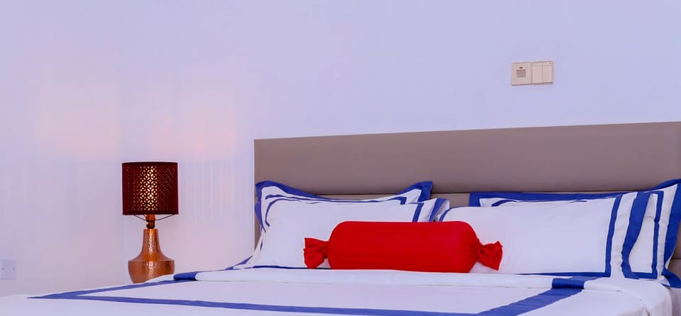 Premium bedding, desk, laptop workspace, free WiFi