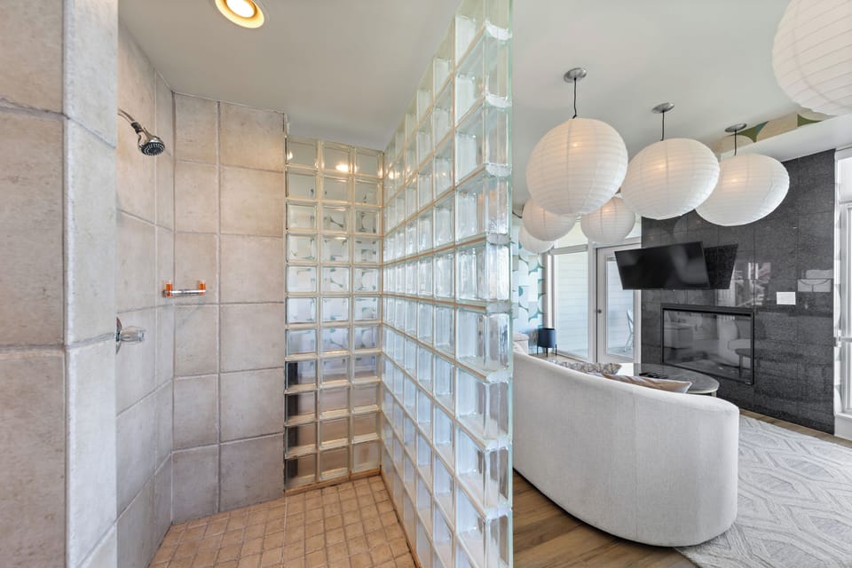 Luxury Suite, 1 King Bed, Fireplace, Bay View (Jacuzzi Contemporary) | Bathroom | Separate tub and shower, jetted tub, designer toiletries, hair dryer