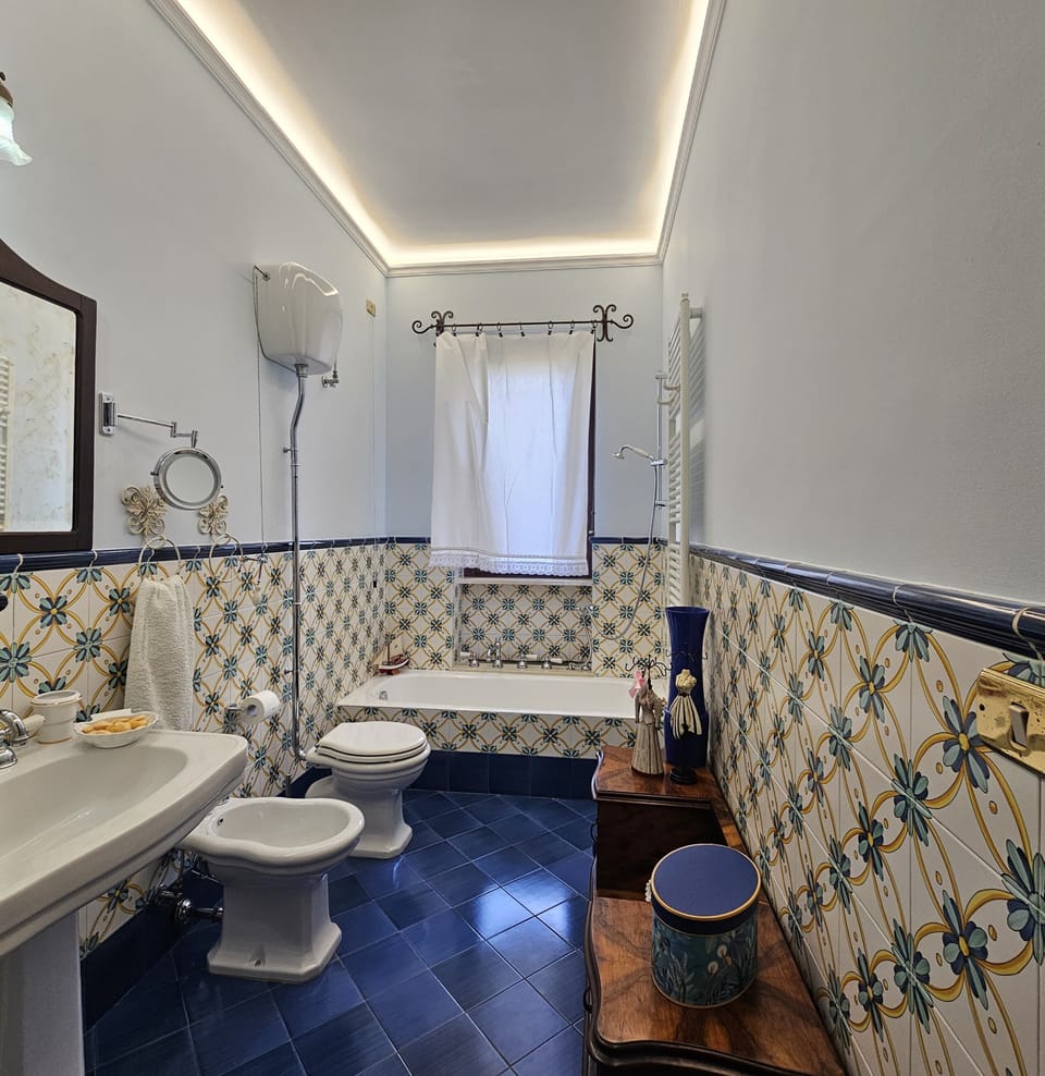 Triple Room, Garden View | Bathroom | Free toiletries, hair dryer, bidet, towels
