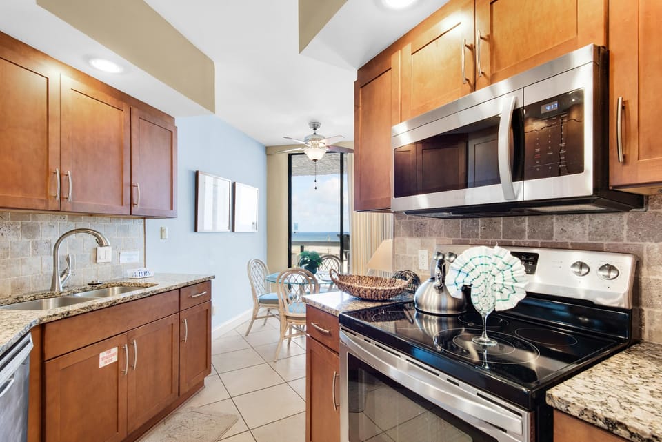 Condo, Multiple Beds (Surfside Resort #505) | Private kitchen | Oven, toaster