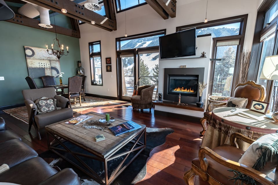 Luxury Condo | Living area | 40-inch flat-screen TV with cable channels, fireplace