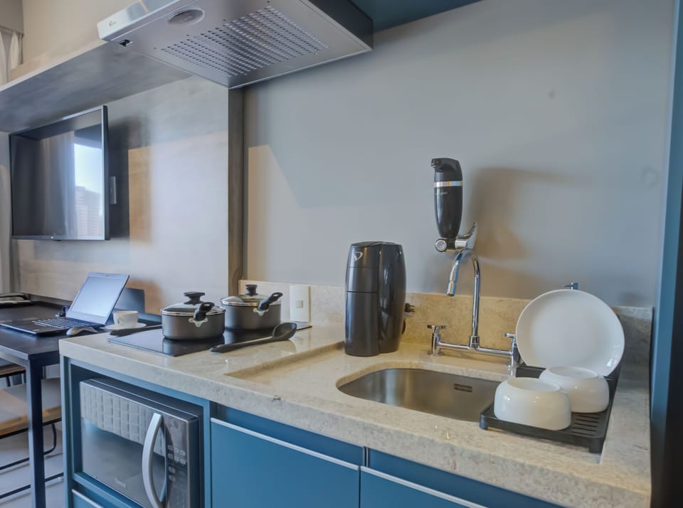 Fridge, microwave, stovetop, cookware/dishes/utensils