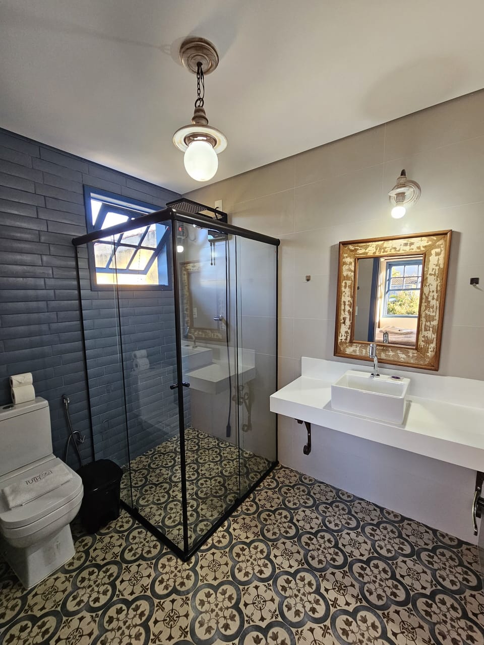 Shower, rainfall showerhead, designer toiletries, hair dryer