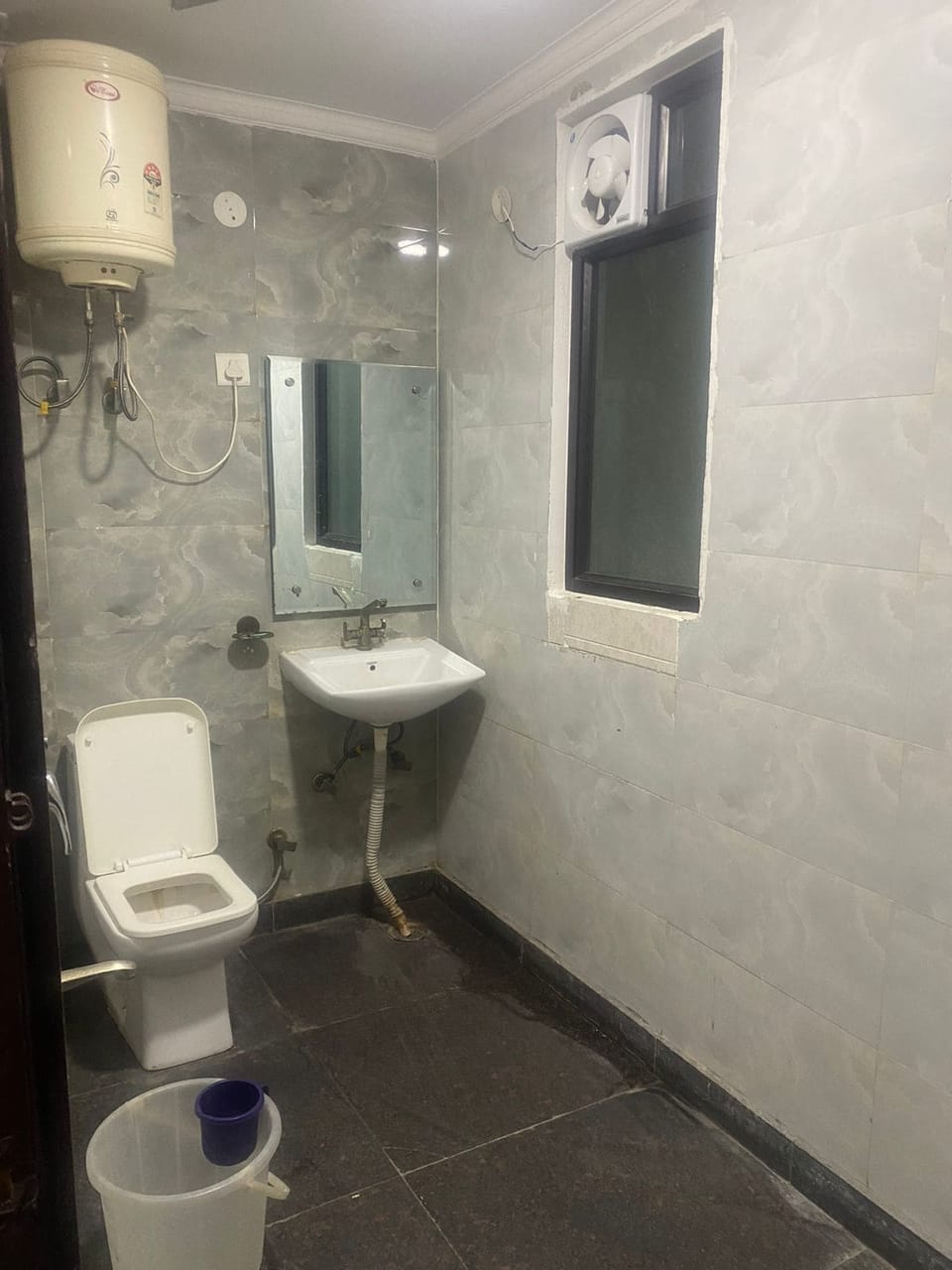 Shower, rainfall showerhead, towels, soap
