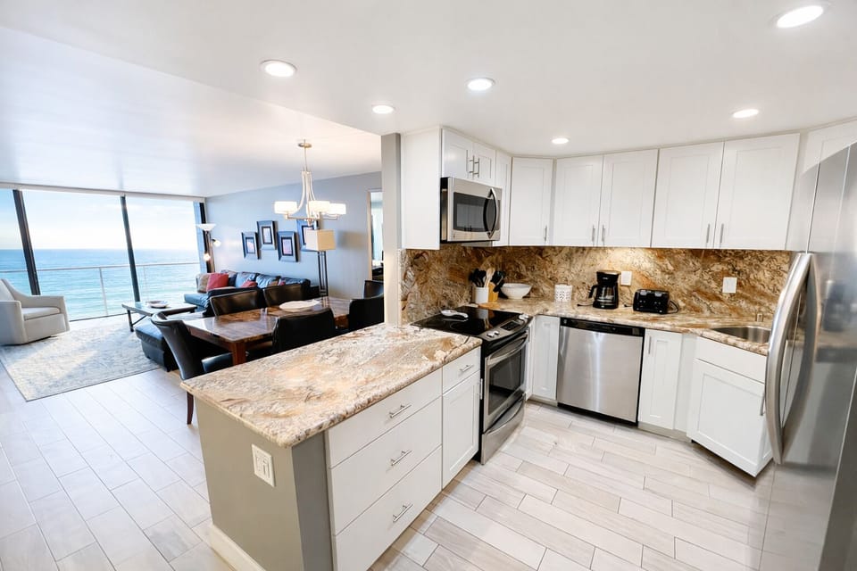 Condo, 2 Bedrooms | Private kitchen | Full-size fridge, microwave, oven, stovetop