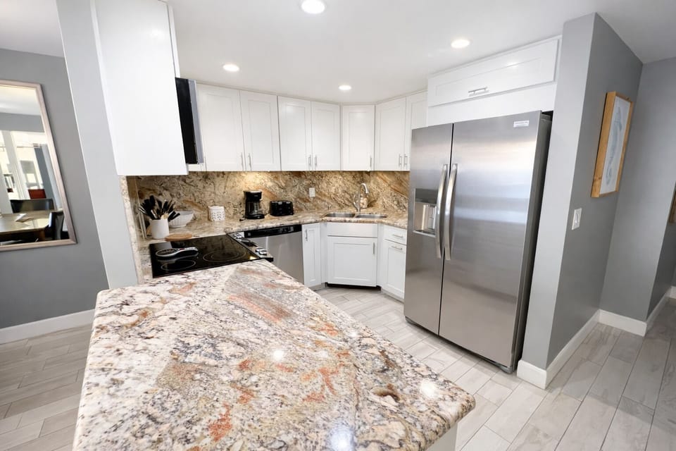 Condo, 2 Bedrooms | Private kitchen | Full-size fridge, microwave, oven, stovetop