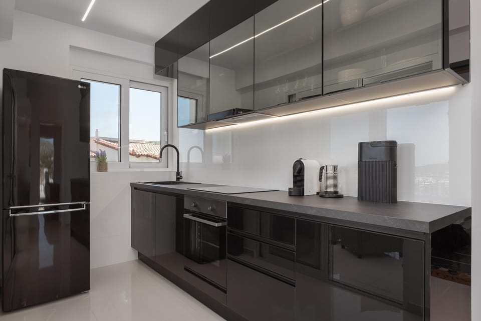 Comfort Apartment | Private kitchen | Full-size fridge, microwave, oven, stovetop