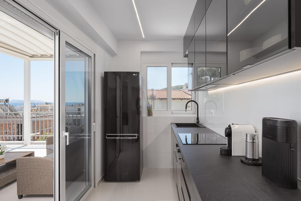 Comfort Apartment | Private kitchen | Full-size fridge, microwave, oven, stovetop