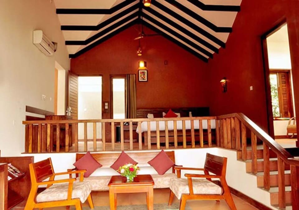 Superior Villa | Living area | 32-inch Smart TV with cable channels