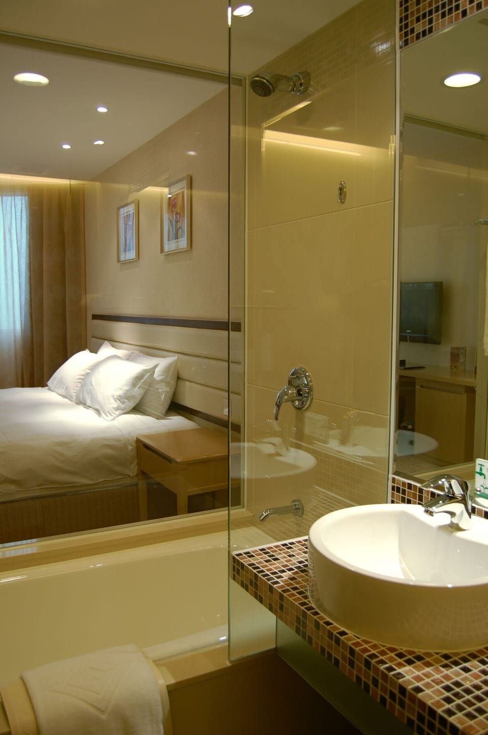 Shower, hair dryer, slippers, towels